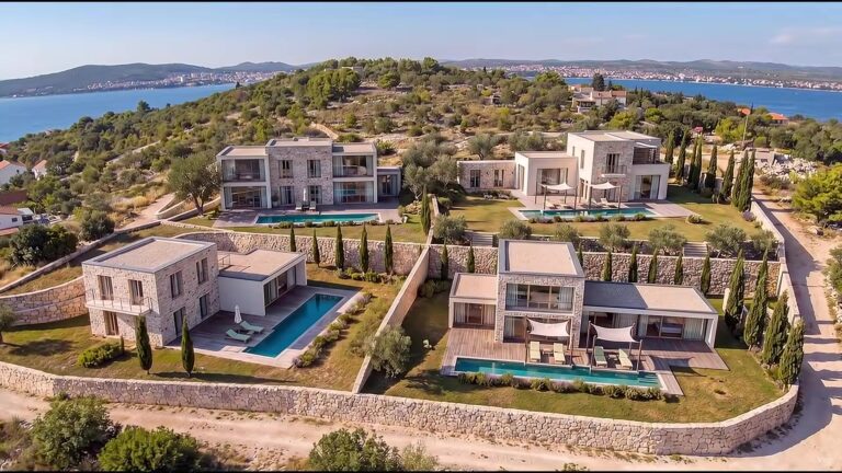 Aerial architectural visualization of a four-villa development on Croatia's Adriatic coast